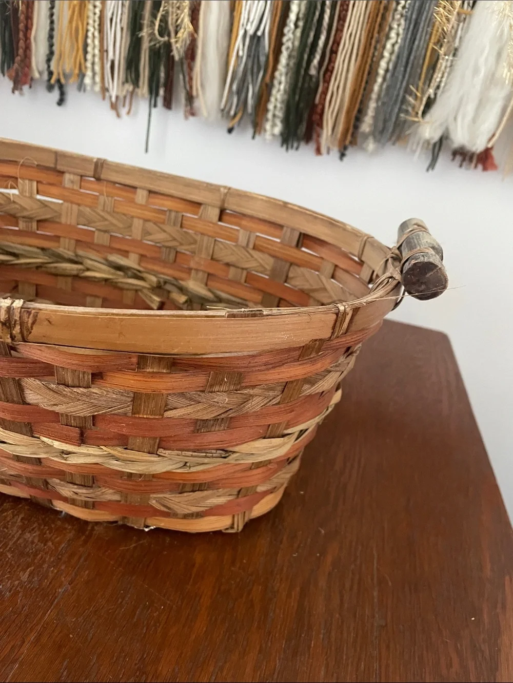 Brown and tan basket with handles